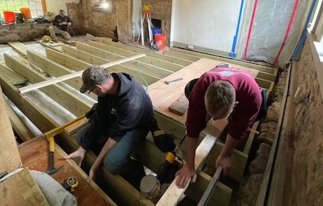 Our team replacing the floor of a historic home